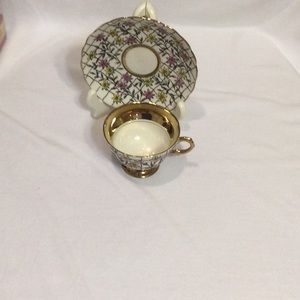 Rosina Footed bone china tea cup and saucer set. Floral design.